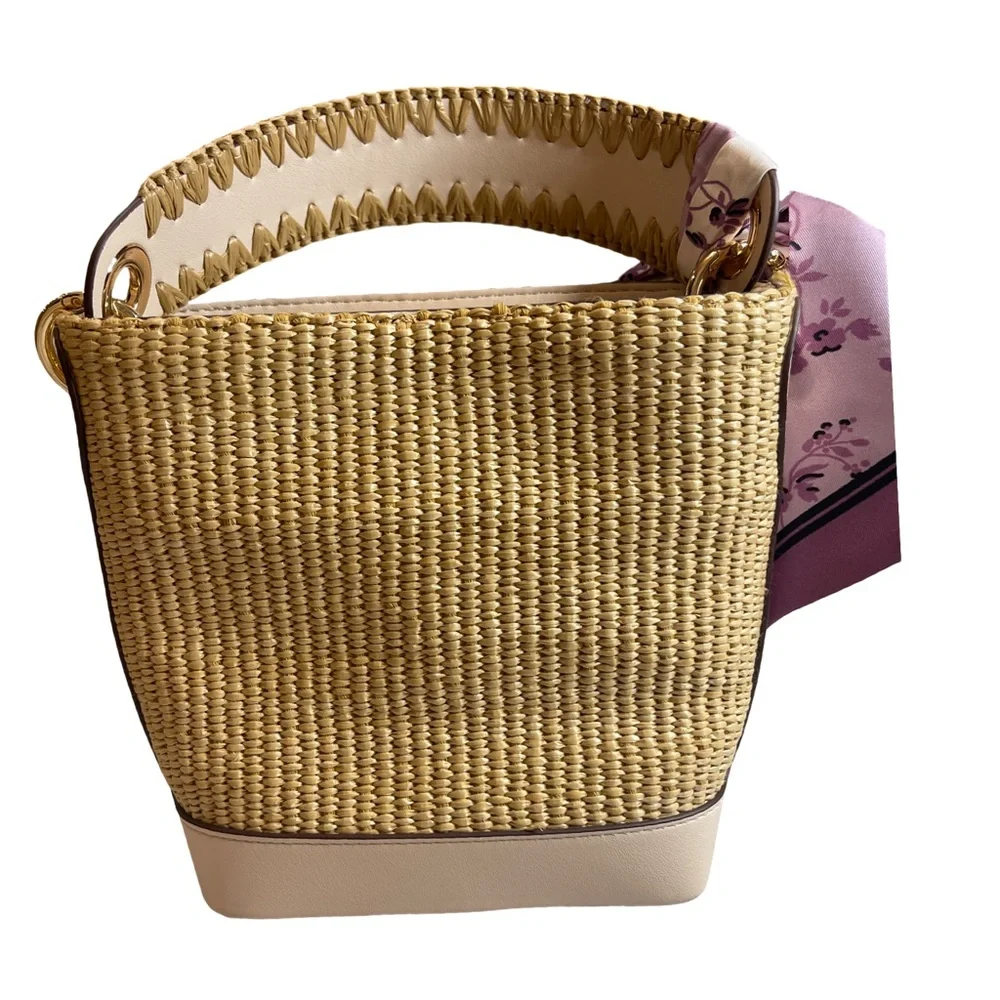 Elegant Straw Crossbody Tote with Floral Scarf Accent and matching coin purse.